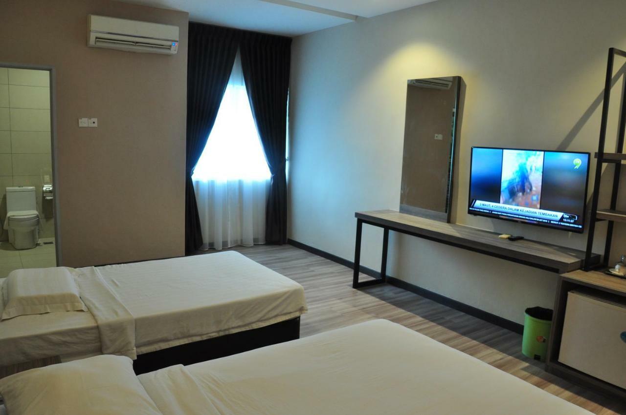 Frazel Inn Hotel Парит-Бунтар Экстерьер фото